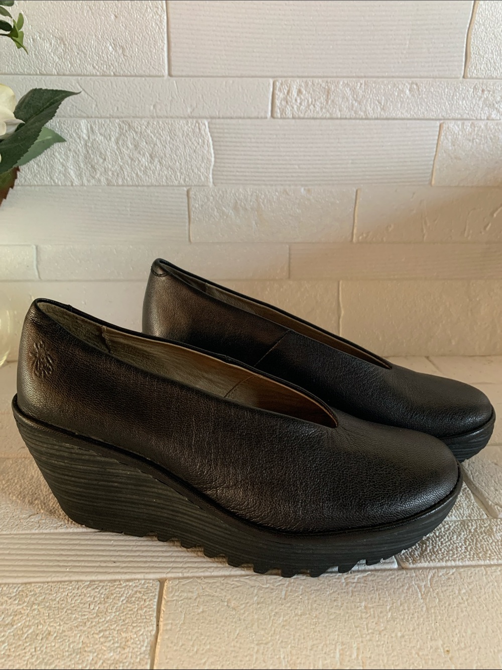Fly London Women's Black Leather Wedge Slip-Ons